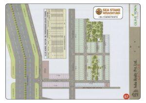 Olive Town Sector 98 Faridabad layout map showing residential plots, landscaped parks, commercial area, wide roads, green belts and township master plan