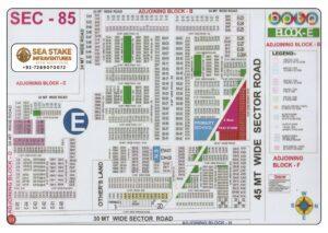 BPTP Sector 85 Block E layout map showing residential plots, Elite Floors, villa plots, Primary School, taxi stand, SCO commercial plots and wide roads in Greater Faridabad